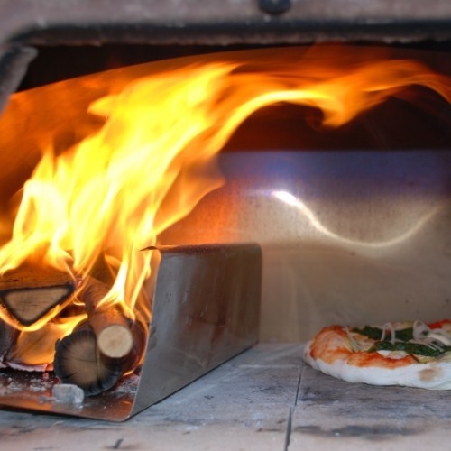 Spartifiamma (Protector de fuego) para hornos de leña